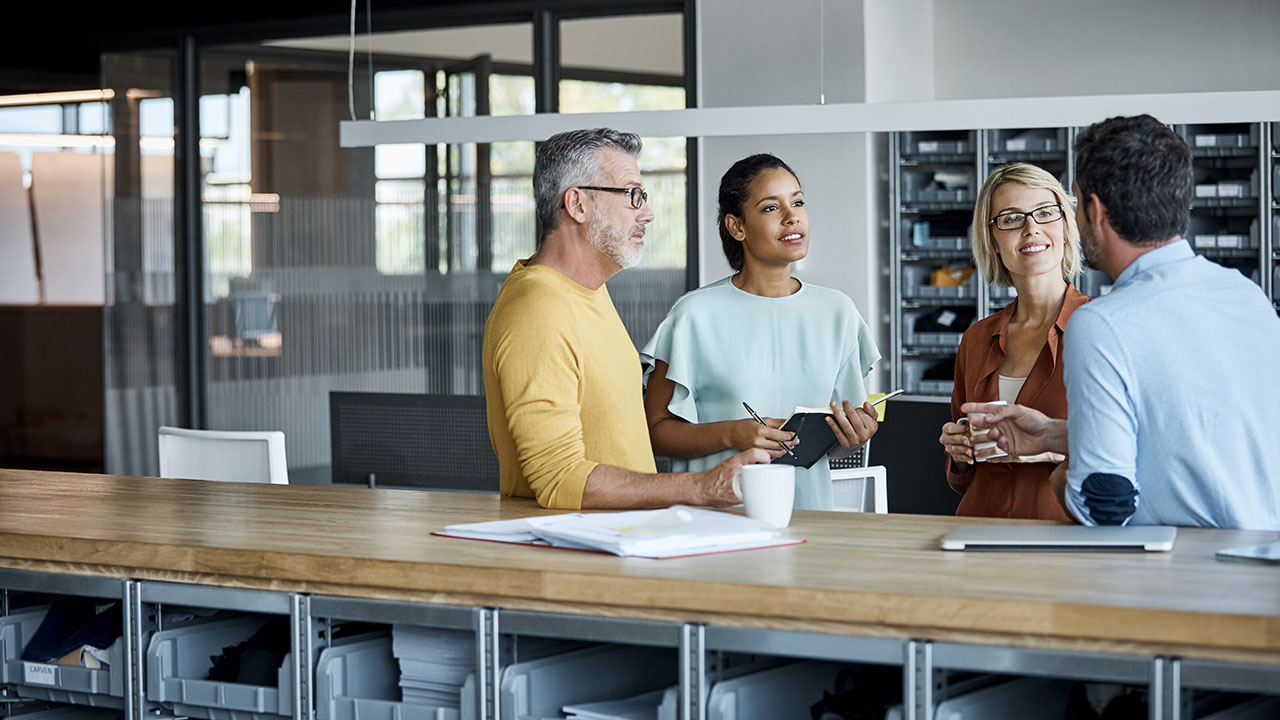 Group of business people having conversation